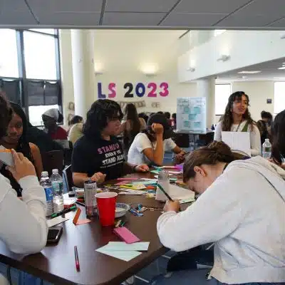 PALS student participants engaged in leadership program activities at Duke University