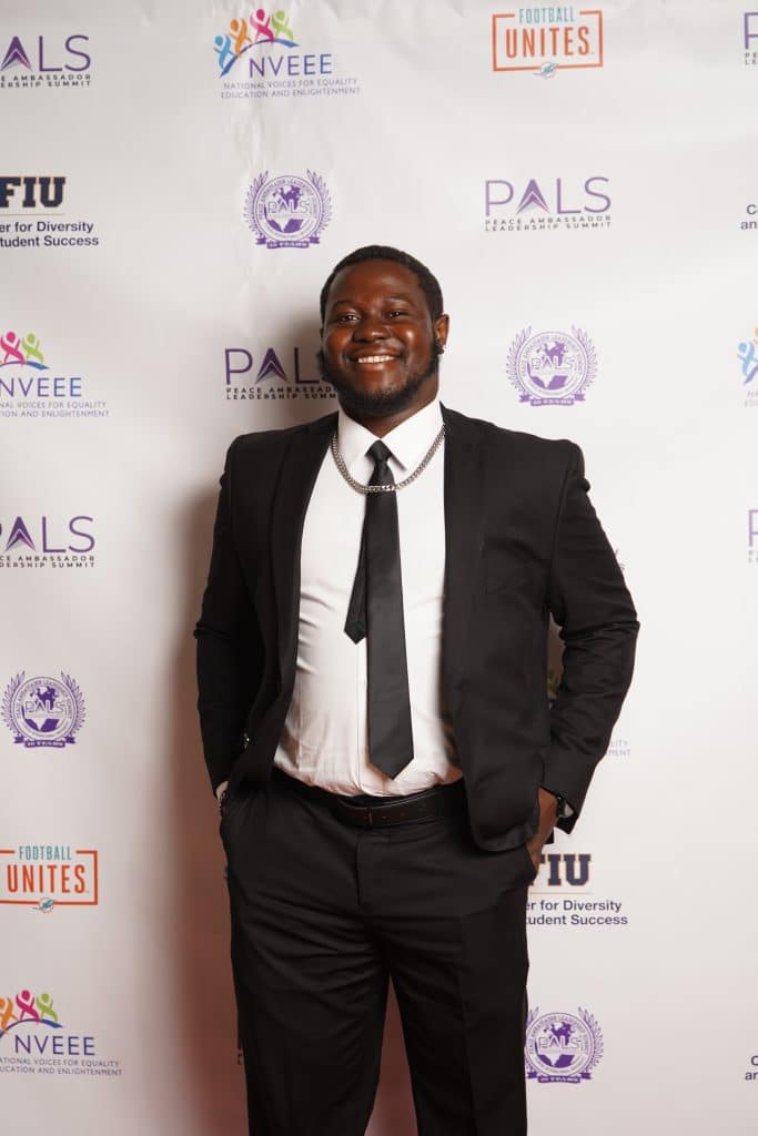 An NVEEE intern in a suit at the PALS banquet
