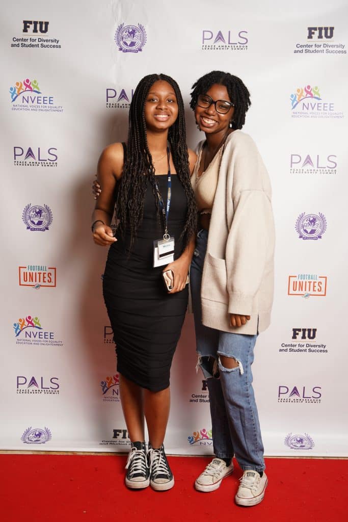 Two interns smiling at the PALS banquet