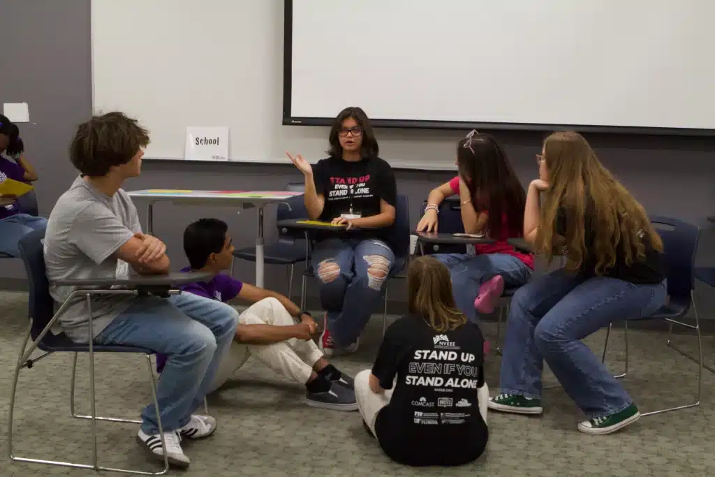 A college mentor leads a small group at PALS at the University of Central Florida