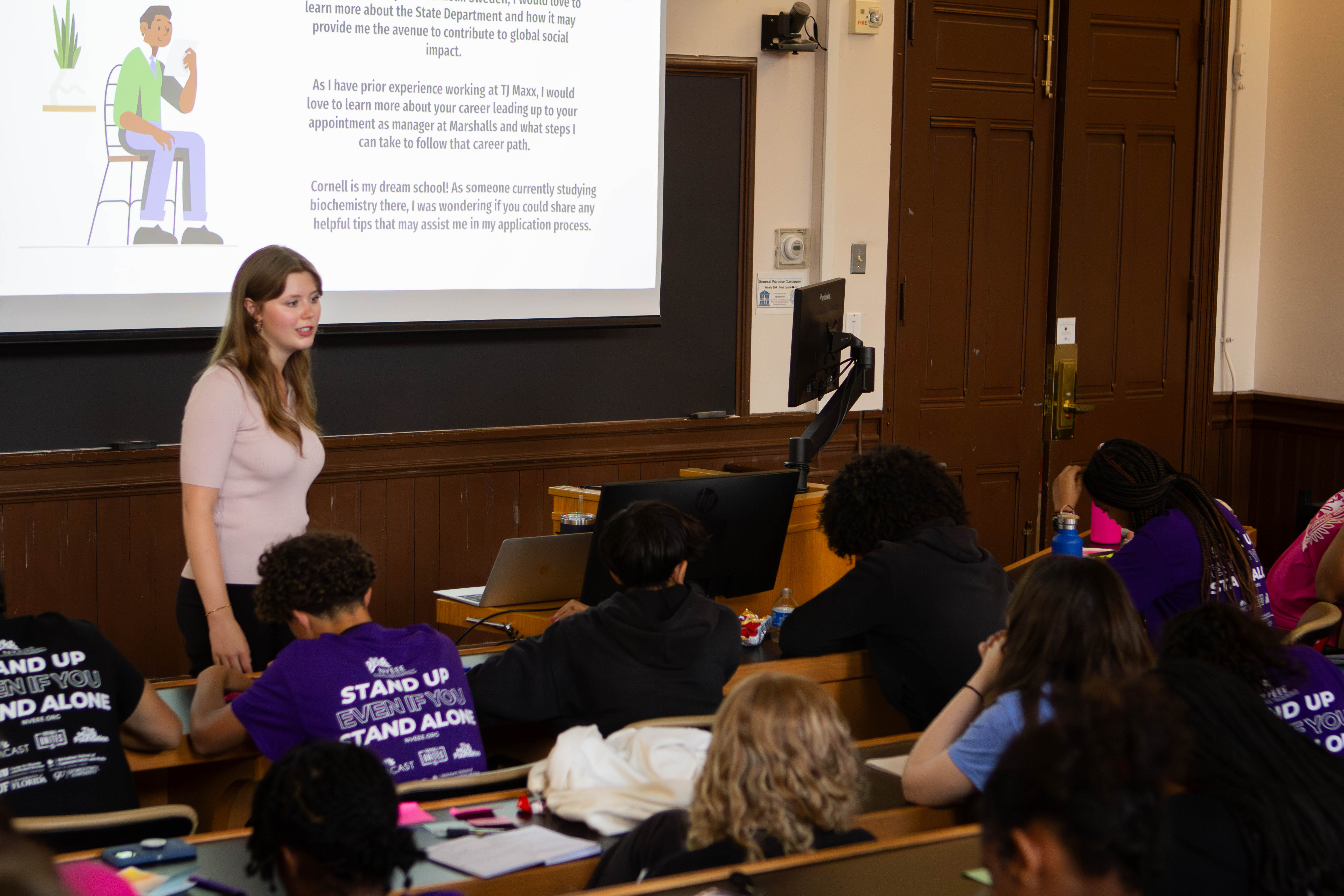 A young leader presenting to a room of students at Georgetown University