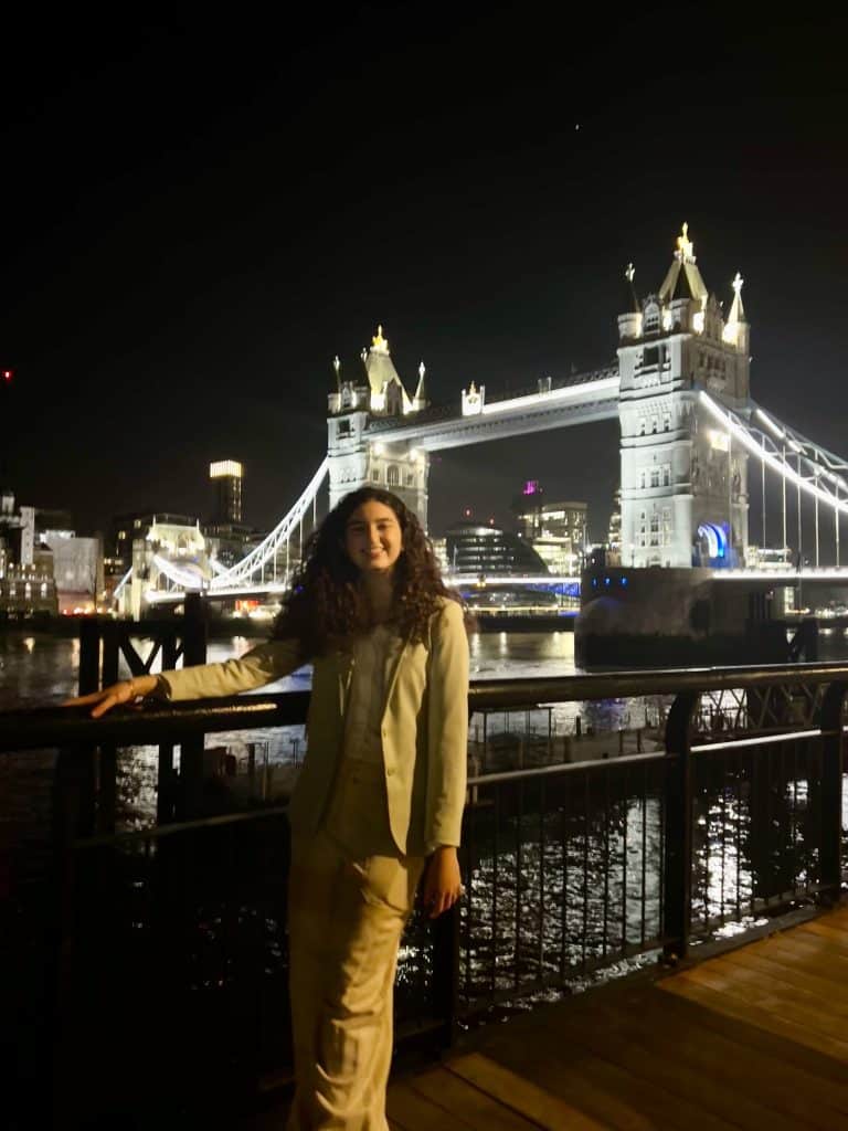 Author in front of Tower Bridge in London